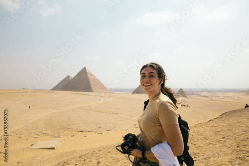 Female photographer at the pyramids of Egypt photo