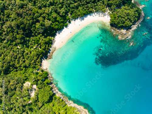 Amazing top view beach Aerial view of Tropical beach sea in the beautiful Phuket island Located at Freedom beach Phuket Thailand