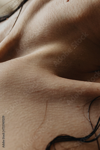 Woman's Neck Close Up with skin texture and collarbones photo