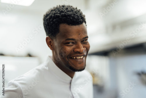 Cheerful black man in white shirt photo