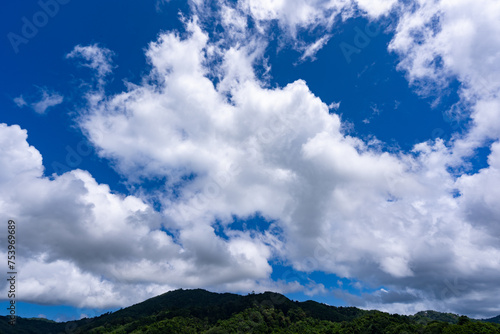 Beautiful blue sky white clouds nature environment background © panya99