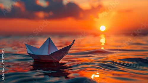 a toy paper boat in the water during sunset 