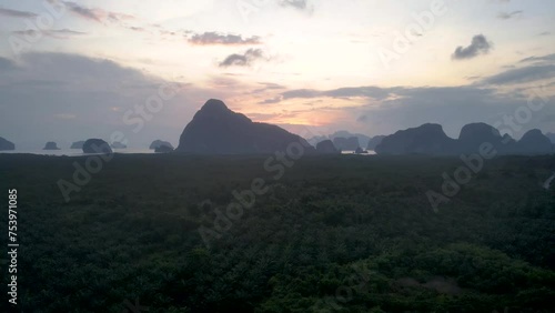 Aerial view Famous location in Phangnga beautiful sunrise sky in the morning sunrise over sea motion panup, famous vacation. photo