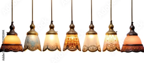 A collection of decorative vintage ceiling lamps hangs from the ceiling, creating an elegant and nostalgic ambiance. The intricate design and warm glow of the lights add character to the room.