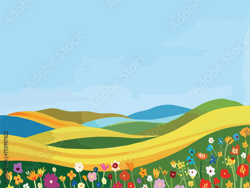 Vibrant flowers on sloping grassland beneath majestic mountain backdrop