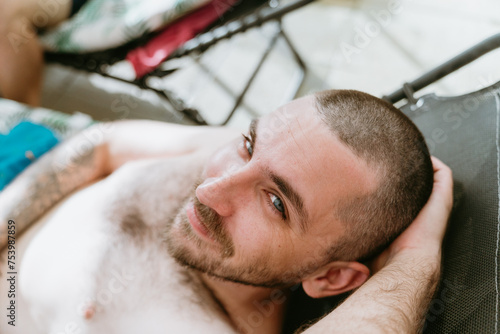 Close-up of Man in pool chair photo