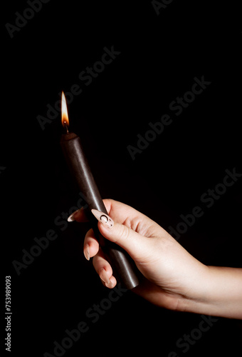 Black Candlestick with Flame  photo