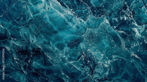 Marble texture background in dark blue and teal shades © furyon