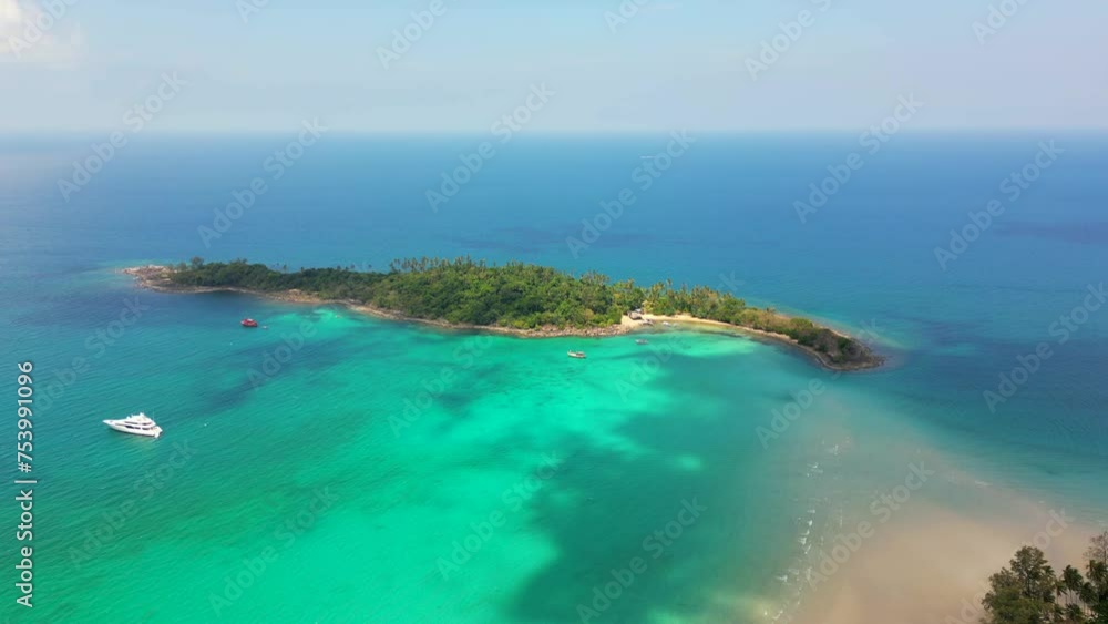 Aerial view of a small secluded tropical island in Thailand. Aerial view of a small secluded tropical island in Thailand.