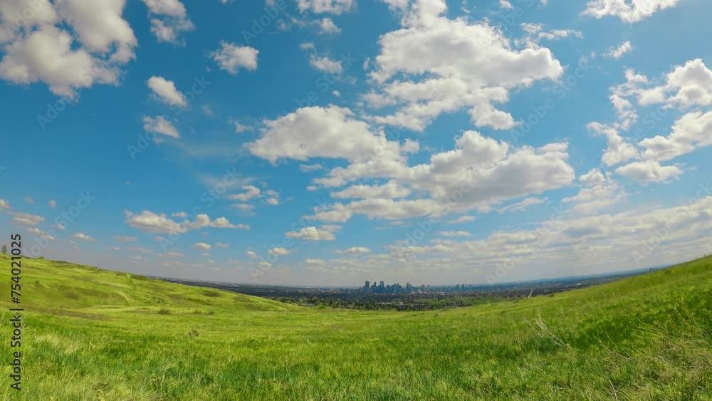 time-lapse cloudscapes fluffy clouds over the city. landscape with blue sky and clouds downtown view in sunny blue sky day. good environment for outdoor activities in summer perfect weather time-lapse cloudscapes fluffy clouds over the city. landscape with blue sky and clouds downtown view in sunny blue sky day. good environment for outdoor activities in summer perfect weather