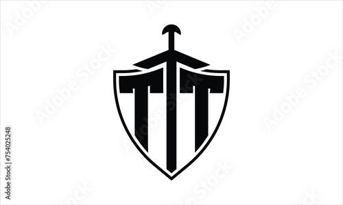 TT initial letter shield icon gaming logo design vector template. batman logo, sports logo, monogram, polygon, war game, symbol, playing logo, abstract, fighting, typography, icon, minimal, knife logo