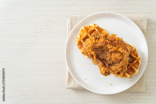 fried chicken waffle with honey or maple syrup