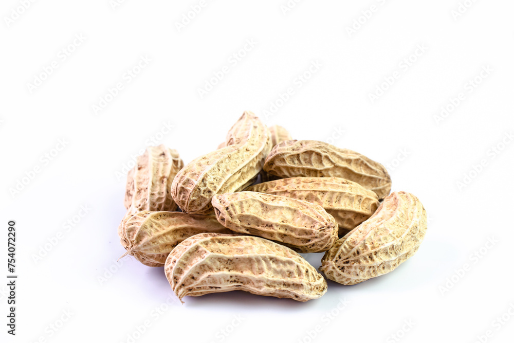peanut, dried groundnut, nut pile on white peanut, dried groundnut, nut pile on white