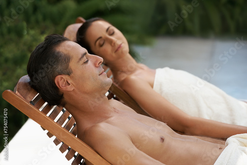 Relax, sleeping and couple at spa on holiday, vacation and travel at resort, hotel and lodge in San Fransisco. Partners, lovers and people on break together for bonding, love and happiness outdoor photo