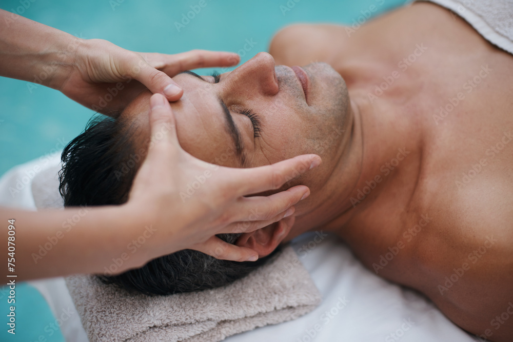 Spa, man and hands with massage for relax at resort, luxury hotel and vacation for wellness and therapeutic pamper. People, masseuse and body care with head treatment, hospitality and zen by poolside Spa, man and hands with massage for relax at resort, luxury hotel and vacation for wellness and therapeutic pamper. People, masseuse and body care with head treatment, hospitality and zen by poolside