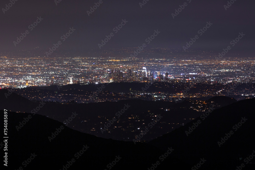 Night view of the downtown skyline of Los Angeles, California, USA from Mount Wilson.
