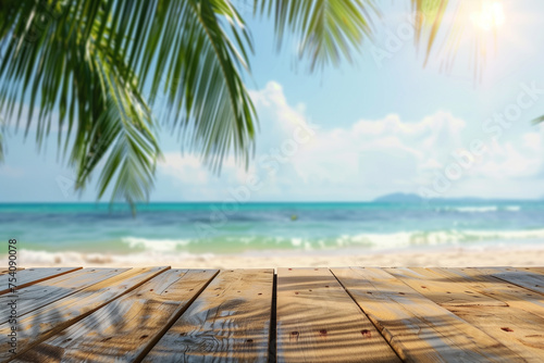 Top of wooden table with sea view and palm leaves Calm sea and sky at tropical beach background show off your products. summer vacation background concept