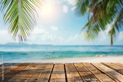 Top of wooden table with sea view and palm leaves Calm sea and sky at tropical beach background show off your products. summer vacation background concept © atitaph