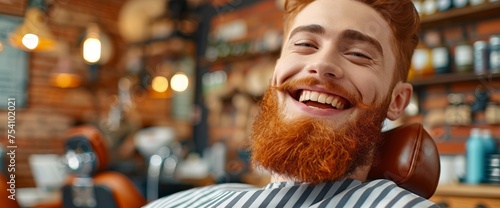 Man With Red Beard Smiles in Barber Shop