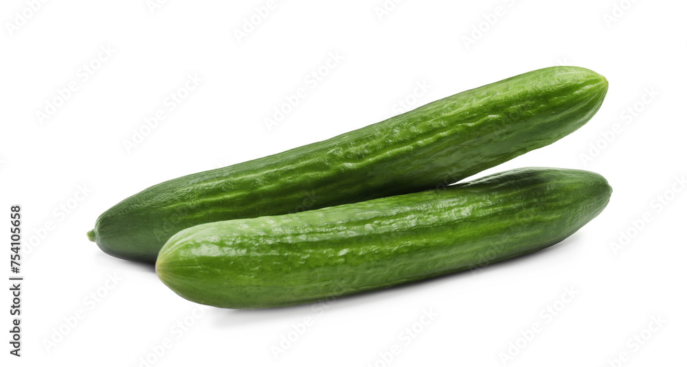 Two long fresh cucumbers isolated on white Two long fresh cucumbers isolated on white