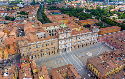 Modena, Italy. Palace - Palazzo Ducale di Modena. Piazza Roma - City square. Panorama of the city on a summer day. Sunny weather with clouds. Aerial view photo