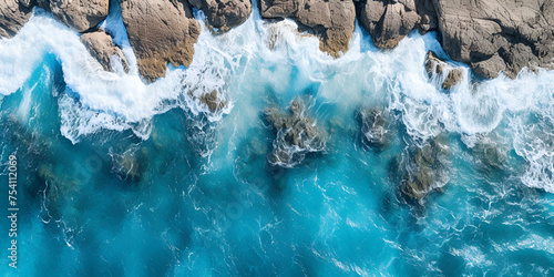 Aerial view of waves in the ocean with blue shade beautiful scenic oceanic day background