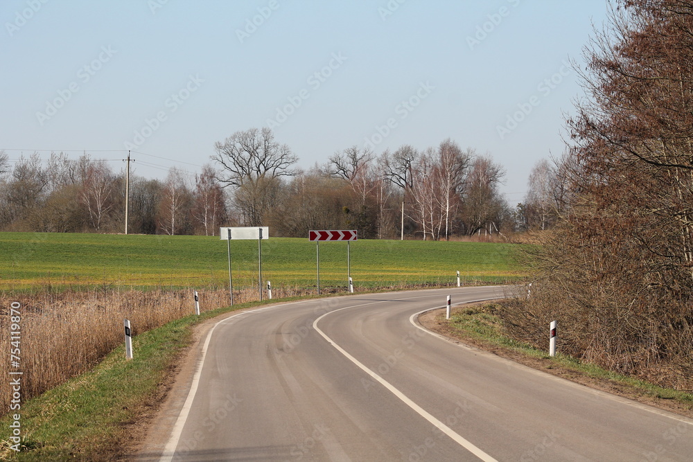 Fototapeta premium road outside the city with a right turn