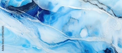 Wallpaper Mural Close up view of a luxurious blue and white marble texture showcasing the polished surface of the natural stone. Torontodigital.ca