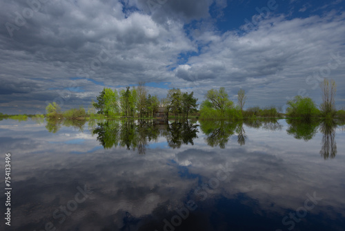 spring landscape with the river and blue sky