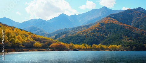 Serene Lake with Autumn Foliage and Mountain Backdrop