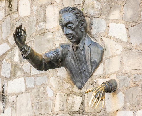 Sculpture of the Passe-Muraille on the place Marcel Aymé in Paris Montmartre
