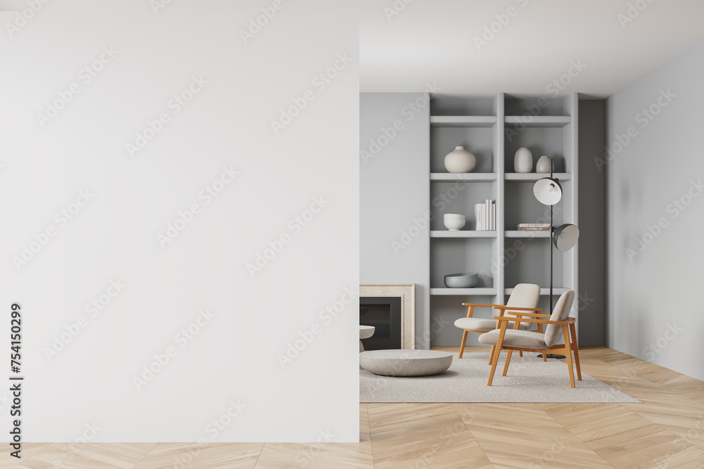 Stylish living room interior with armchairs and fireplace. Mockup empty wall - obrazy, fototapety, plakaty 