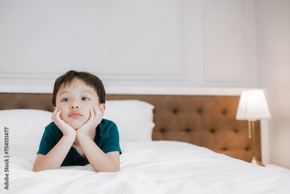 Little boy watching television at home. Copy space. Soft focus. Little boy watching television at home. Copy space. Soft focus.