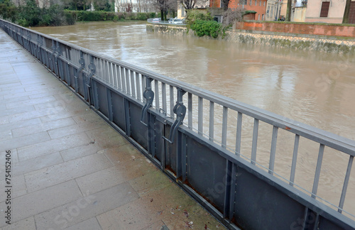 metal bulkhead to raise the level of the river bank during the flood to avoid flooding photo