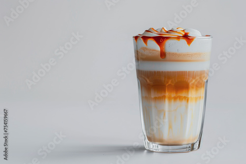delicious Caramel Macchiato - Layered drink with vanilla syrup steamed milk