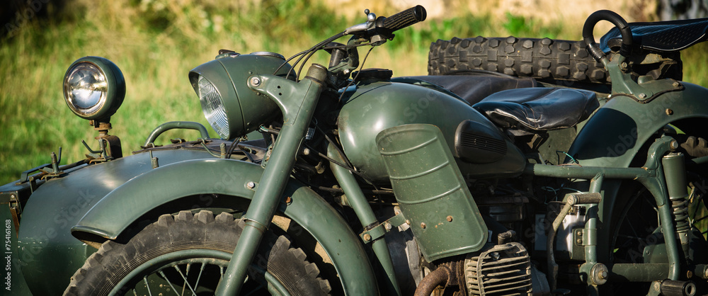 MILITARY MOTORCYCLE - An old Soviet machine in camouflage colors
MILITARY MOTORCYCLE - An old Soviet machine in camouflage colors
