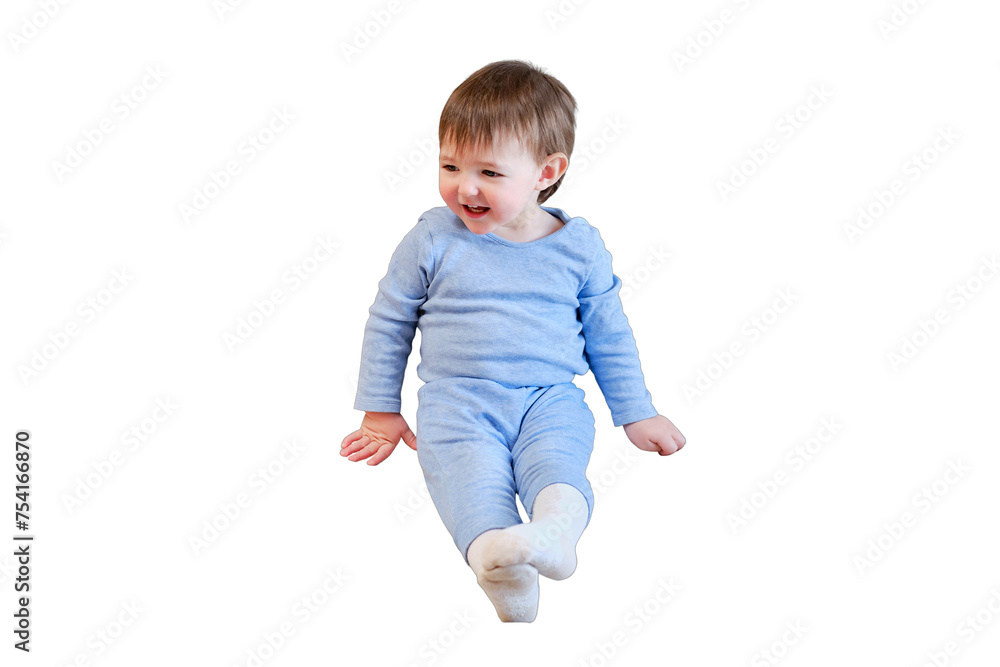 Happy toddler boy in blue clothes sits, isolated on white background. Child age one year five months in the home living room, full length Happy toddler boy in blue clothes sits, isolated on white background. Child age one year five months in the home living room, full length