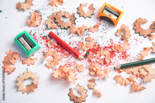 A pencil sharpener with a pencil and pencil shavings. photo