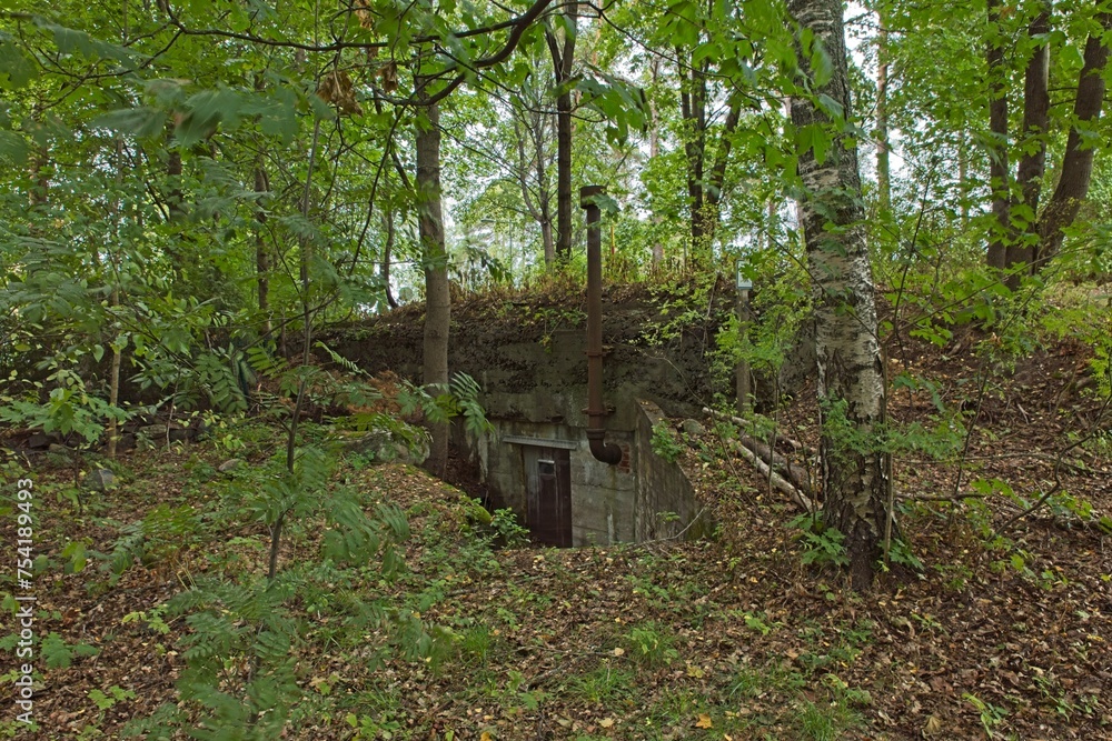 Old WW1 fortification Krepost Sveaborg ruins in forest in summer, Mäkkylä, Vantaa, Finland. Old WW1 fortification Krepost Sveaborg ruins in forest in summer, Mäkkylä, Vantaa, Finland.