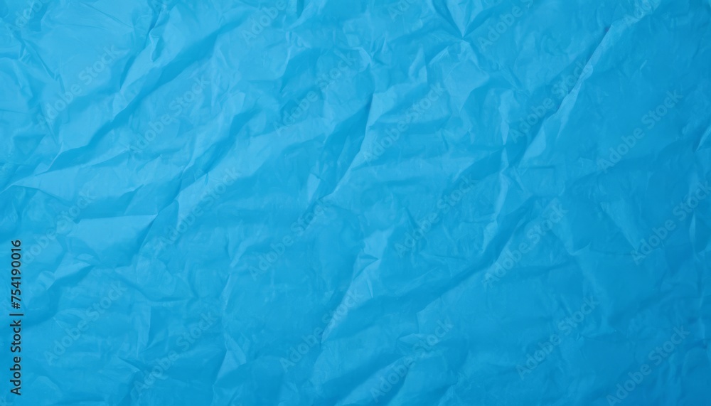 Blank blue crumpled and creased paper poster texture background Blank blue crumpled and creased paper poster texture background