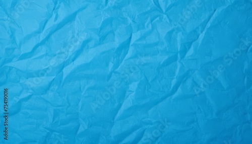 Blank blue crumpled and creased paper poster texture background