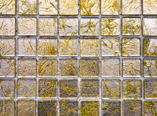 Yellow tiny mosaic tiles. © GIS