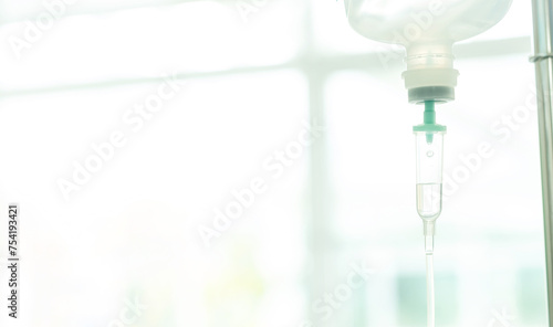 Saline intravenous (IV) drip for patient in hospital., Medical Concept, treatment emergency. Copy space. Soft focus.  photo