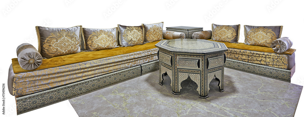 Large moroccan couch with cushions and ornated table isolated