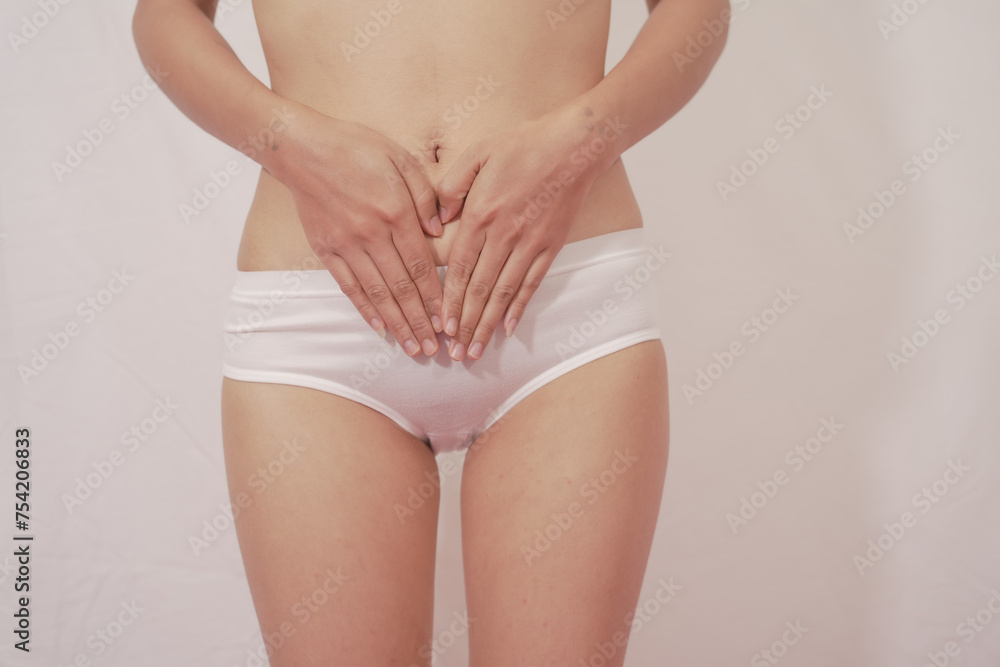 Close-up of woman wearing white panties On a white background about menstruation, cervical cancer, ovarian cancer.