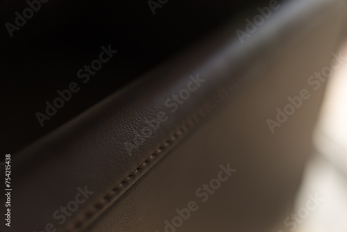 Closeup detail shot of leather chair indoor