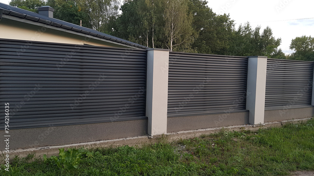 Obraz premium Modern metal fence with shutters