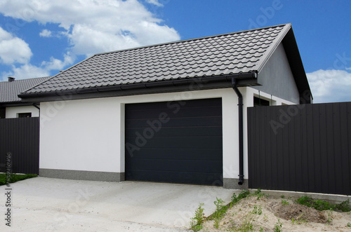 Modern automatic garage sectional doors © Sergey