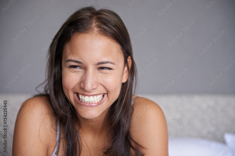 Bed, happiness and woman with smile to wake up on soft mattress in bedroom of home. Apartment, female person and girl in peace with healthy sleeping, relax and rest in house for break in weekend Bed, happiness and woman with smile to wake up on soft mattress in bedroom of home. Apartment, female person and girl in peace with healthy sleeping, relax and rest in house for break in weekend