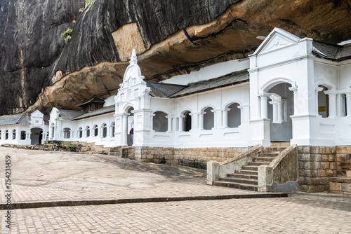 views of dambulla cave entrance, sri lanka photo